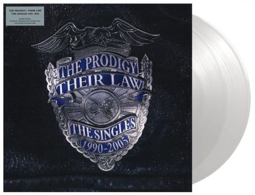 Обложка на албума The Prodigy - Their Law: (2 VINYL) има дизайн на сребърна полицейска значка със сини знамена и прозрачна винилова плоча на Prodigy, която се вижда частично от дясната страна.