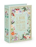 Светлосиня Legami Bling Book - винтидж кутийка за бижута във формата на книга, с цветни цветя, златни акценти и надпис "A Book Lover Never Goes to Bed Alone" (Любител на книгите никога не си ляга сам) отпред, с подходящи флорални мотиви и текст на гръбчет