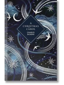 Корицата на "Коледна песен" (Vintage Collector's Classics): тъмен звезден фон с вихрени бели линии, снежинки и птици, както и заглавието и авторът в синя ромбовидна кутия - луксозно подаръчно издание.