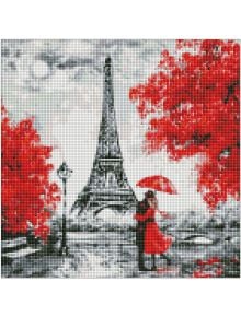 Двойка стои под червен чадър до Айфеловата кула, заобиколена от червени дървета и стълб с лампи, в черна, бяла и червена 5D сцена. Тази сцена е от филма Диамантен гоблен Идея - Айфеловата кула, напомнящ картини с диаманти.