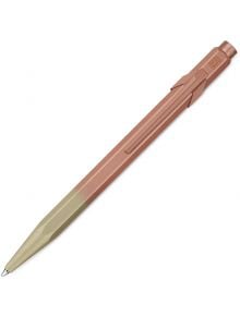 Метална Химикалка Caran d'Ache 849 със елегантен шестоъгълен корпус, оцветен в градиент от златно до розово злато, с клипс и бутон-специално издание, налична в книжарница Orange.