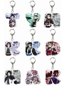 Девет убийци на демони: Kimetsu no Yaiba Chain B акрилен ключодържател ключодържатели, всеки с уникален герой на цветен фон и неговото име, са изложени в три реда със сребърни халки, прикрепени в горната част.