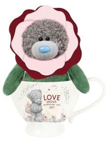 Комплект Me To You - Чаша с плюшено мече Love Grows: плюшено мече Tatty Teddy, облечено като цвете, в декорирана чаша с изображение на мече и надпис "Love grows wherever you go!" - Чаровен подарък.