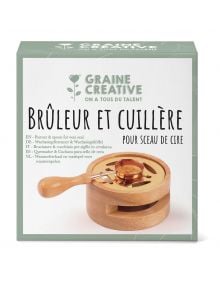 The Комплект за восъчни печати Graine Creative съдържа дървена поставка за разтапяне и метална лъжичка, подходящи за восъчни печати и украсяване на покани. Опаковката е с текстове на няколко езика.