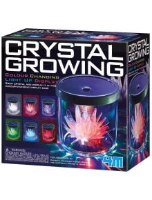 Опаковката на Креативен комплект 4М - Отгледай кристали в цветен дисплей показва светещи цветни кристали в дисплей, с информация за продукта - идеален избор за любителите на образователни играчки.