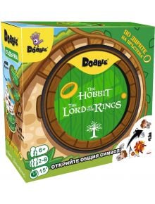 Dobble Властелинът на пръстените: Настолна игра с кутия в зелено и златно, кръгли карти и символи от филмите. За 2-8 играчи, възраст 6+, време за игра 15 мин. Текстът на българския и английския език. Открий я в книжарницата.