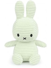 The плюшена играчка Miffy Eco Corduroy - бледозелен заек, 23 см е меко зайче с дълги уши, черни бродирани очи и X-образна уста от Bon Ton Toys - сладък и екологичен избор за всяко дете.